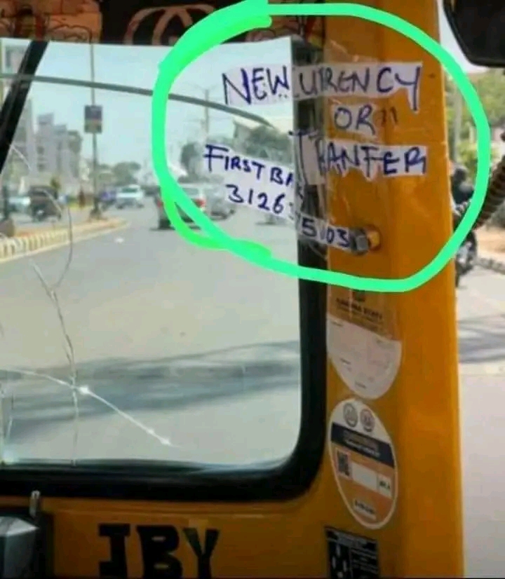 Kekenapep driver place his account details on his keke for a transfer instead of collecting the old naira note 