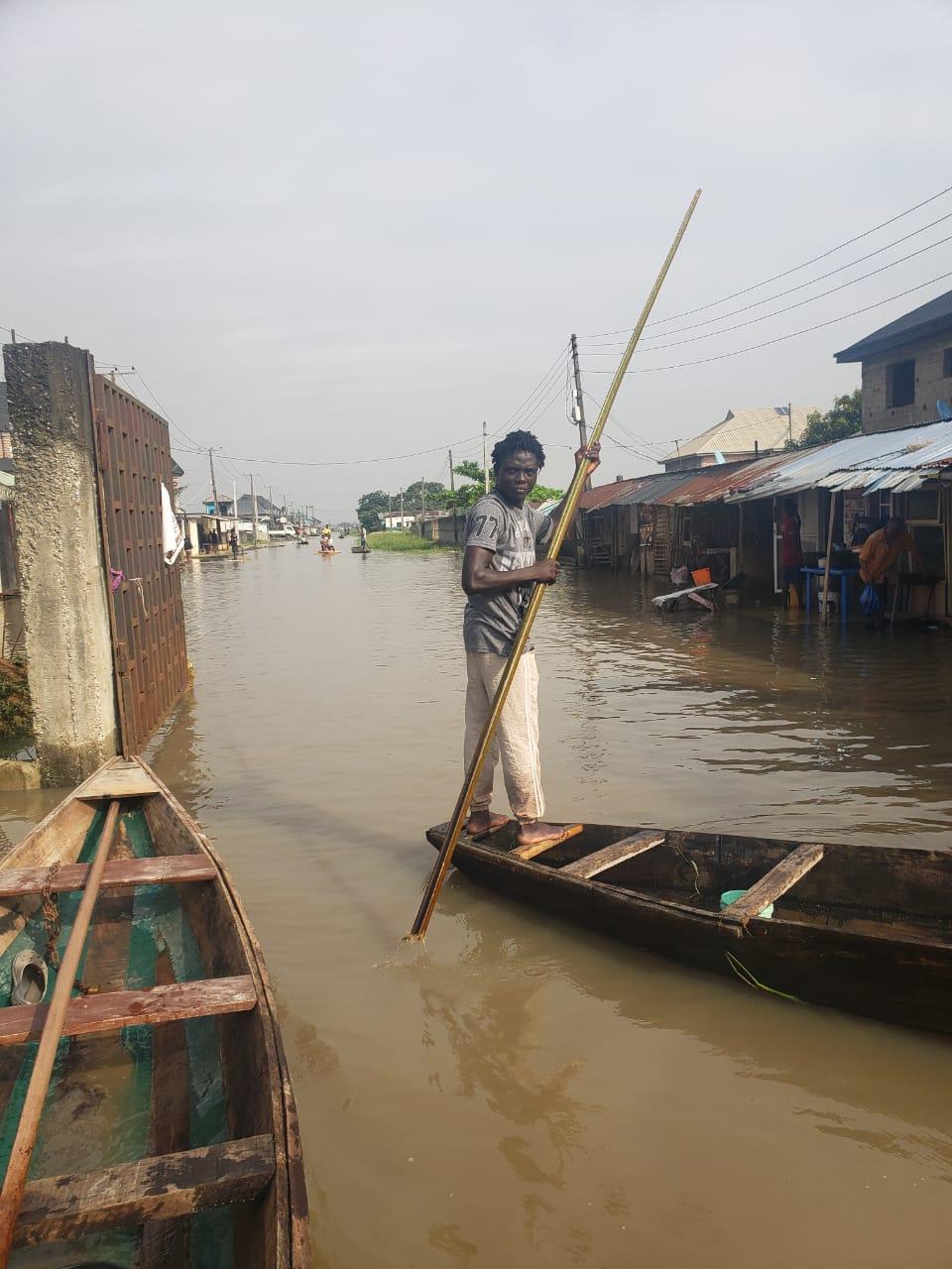 Flood Submerges Lagos Community, Residents Resort To Canoe